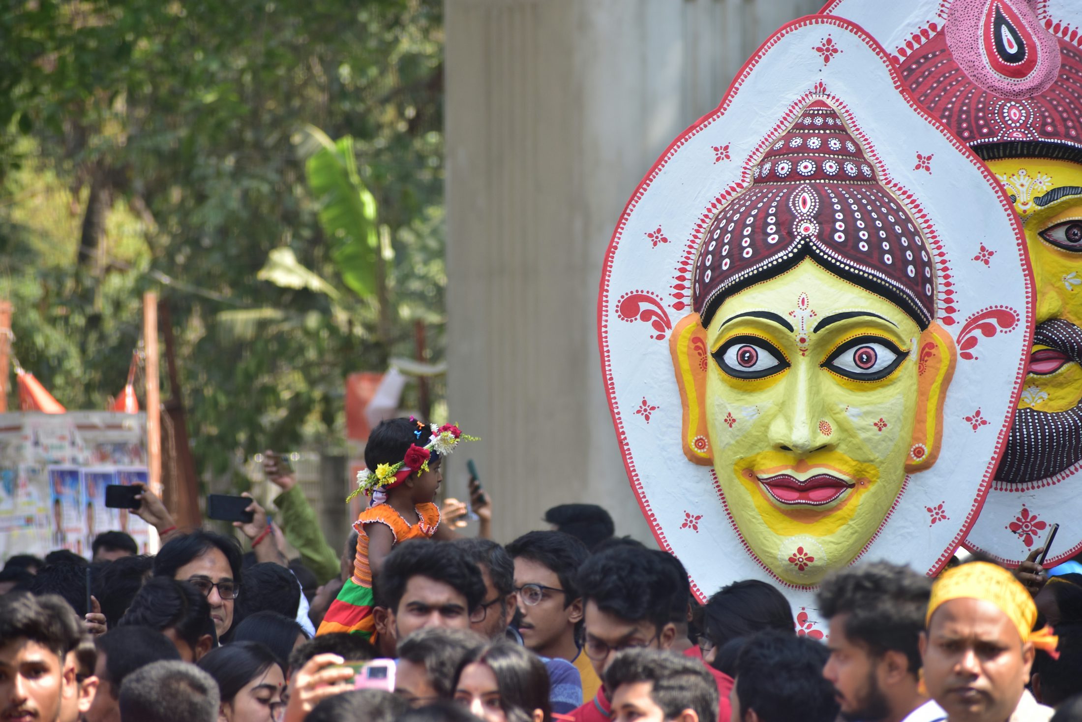 Pohela Boishakh crowd and traditional mask