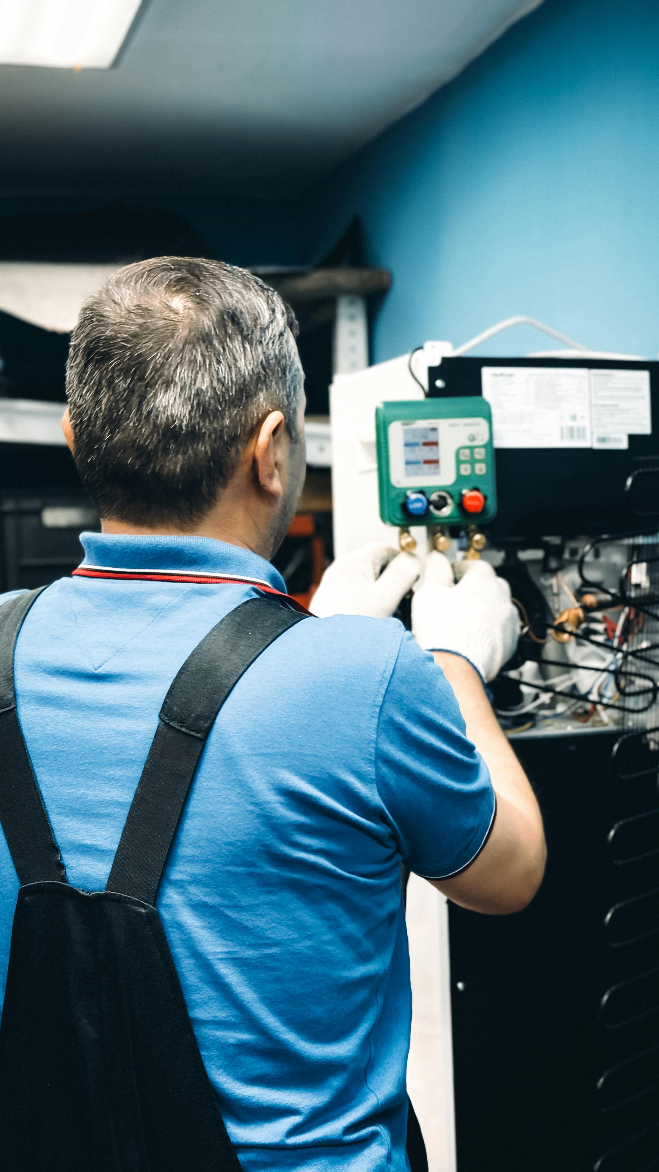 Technician repairing a home appliance